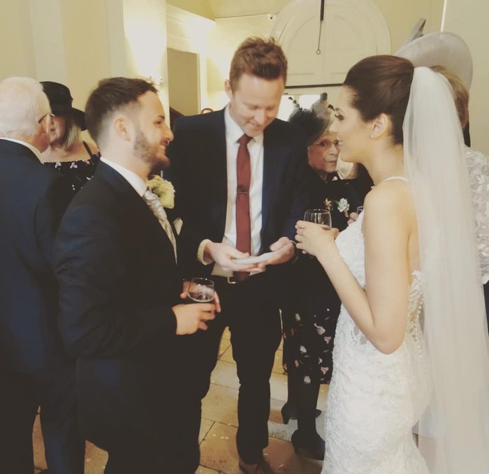 Guests reacting with delight during close-up magic