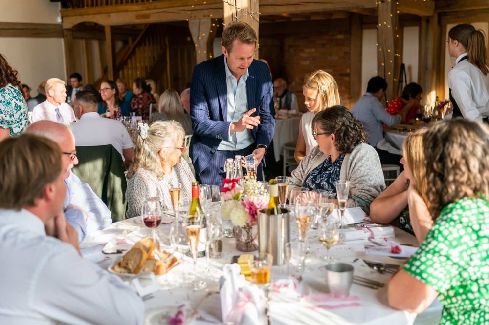 Richard Kettle performing close-up magic at a Surrey wedding barn venue